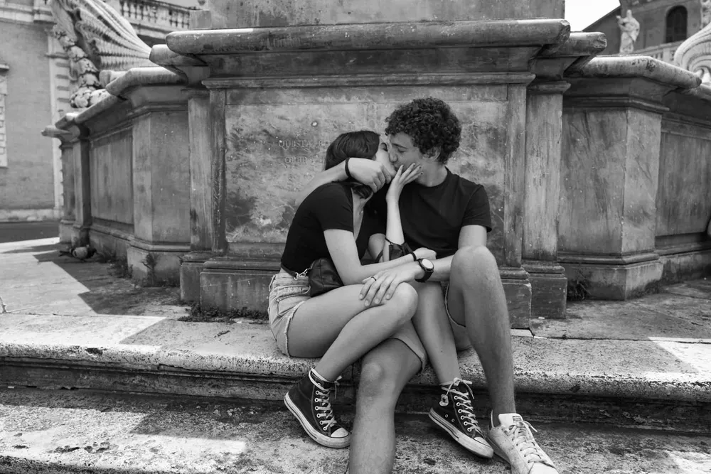 Kissing — photograph by Eolo Perfido