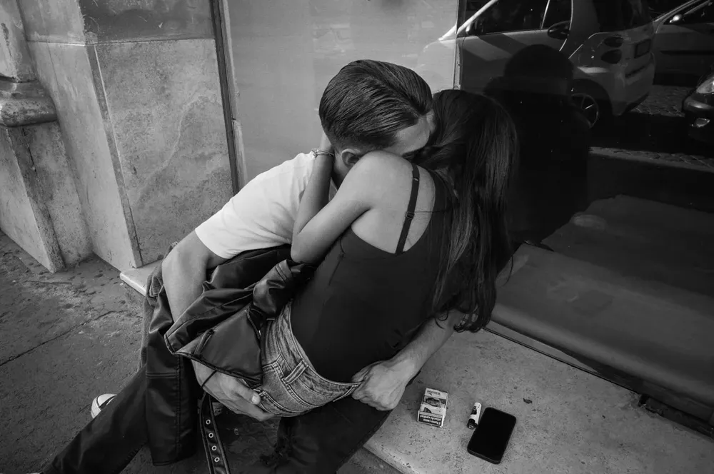 Kissing — photograph by Eolo Perfido