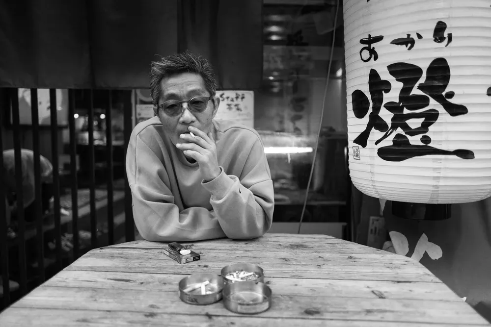 Smokers — photograph by Eolo Perfido