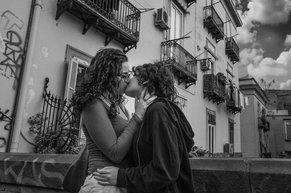 Kissing — photograph by Eolo Perfido