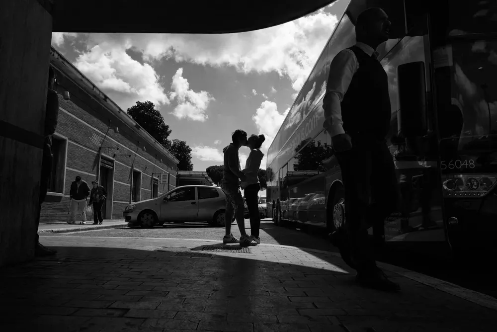 Kissing — photograph by Eolo Perfido