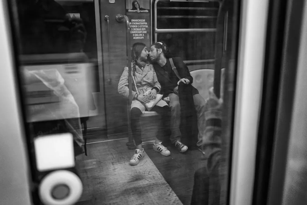 Kissing — photograph by Eolo Perfido