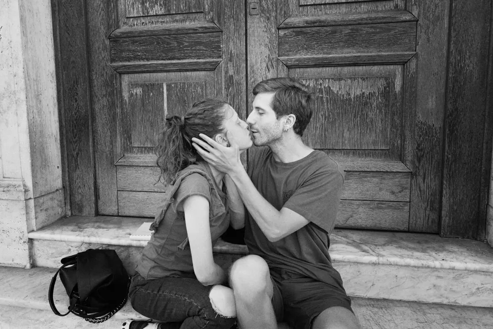 Kissing — photograph by Eolo Perfido