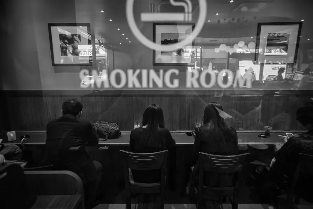 Smokers — photograph by Eolo Perfido