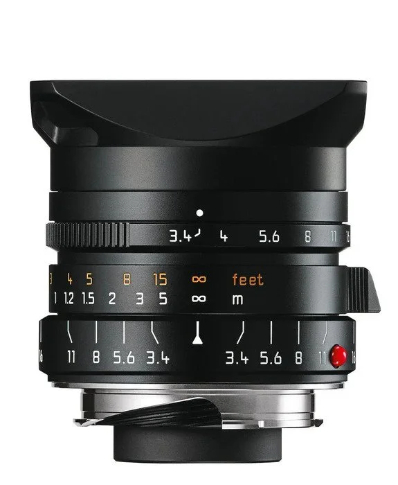 Black Leica wide-angle lens with hood on a white background