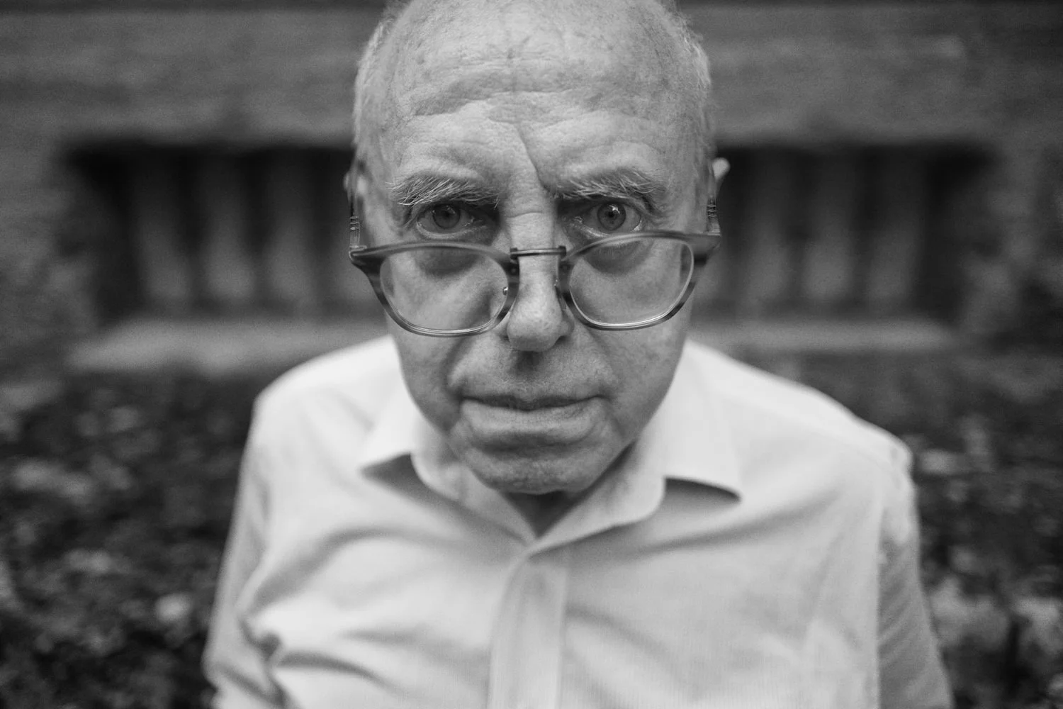 Close portrait of an older man wearing glasses