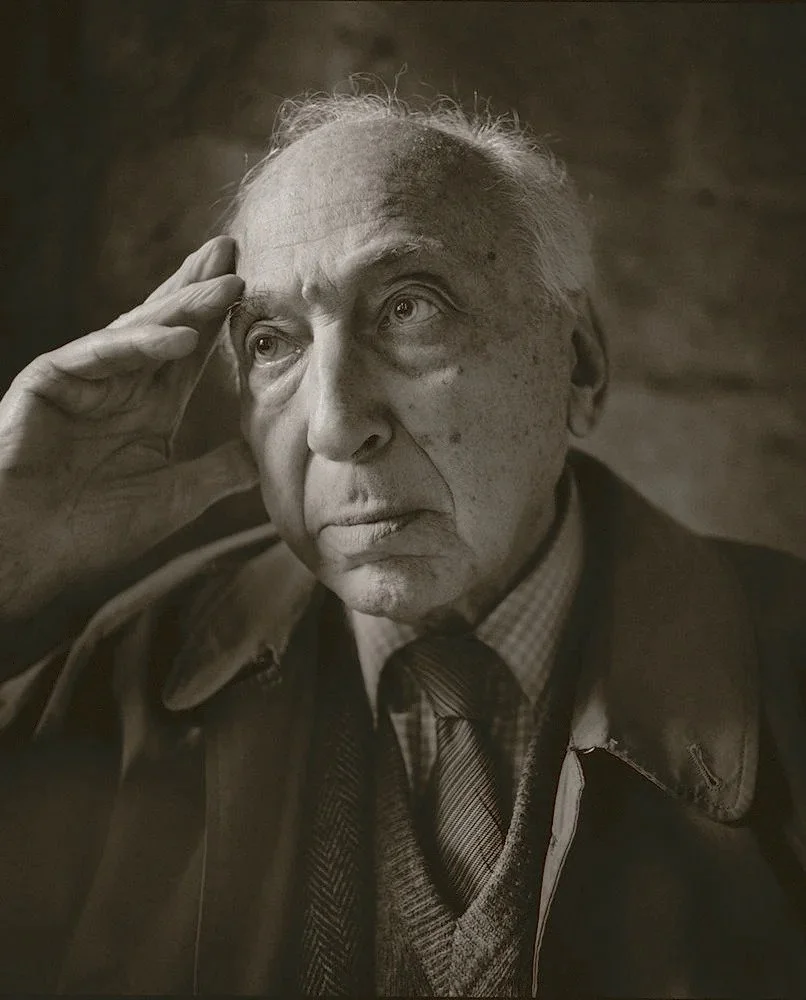 Portrait of André Kertész with his hand resting at his temple